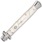The 7 1/4” closed pocket knife has faux pearl handle scales, and the push button and slide lock are conveniently on top