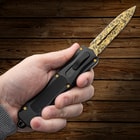 Full image of the OTF Knife open being held in hand.