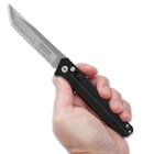 Full image of the Blackhawk Automatic Pocket Knife held in hand.