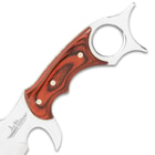 The Gil Hibben Bloodwood Karambit illustrates the uniqueness of design that he always brings to the table