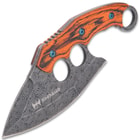 The handle scales are ergonomically grooved bloodwood, secured with heavy-duty screws, and it features thumb jimping