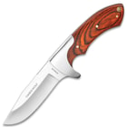 The 9” knife has a 4 1/8” stainless steel blade with “Timber Wolf” on the blade and hardwood handle.