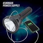 Full image of the LED Spotlight Flashlight charging a cell phone with its 4500 mAh power supply.