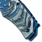 This image shows a close up of the artwork on the witcher pocket knife.