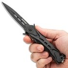 Full image of the Folding Tactical Knife held in hand.