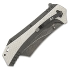The monster assisted opening pocket knife is a whopping 7”, when closed, and 12”, when fully open, and it has a pocket clip