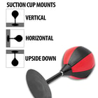 The Desk Strike Punching Bag shown being mounted several ways with its suction cup