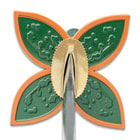 A close-up view of the clover-shaped tsuba