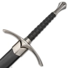 The grooved handle is wrapped in genuine black leather and the knob-styled handle is pewter-colored metal alloy