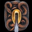 Zoomed view of sculpted snake desgined tsuba with a bronze finish with blade protruded through brass habaki
