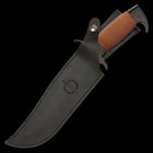 The knives have copper-colored, wire-wrapped handles with black, chrome-finished metal pommels and handguards