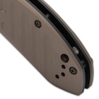 The automatic pocket knife is 5”, when closed, and 8 7/10” overall