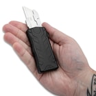 The box cutter shown in hand