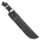 The 20 1/2" overall machete fits snugly in its tough nylon belt sheath with snap closure and “Raptor” printed in red letters on the front.