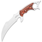 The keenly sharp knife has a curved, 5 3/8” 5Cr15MoV stainless steel blade that has an over-sized finger choil for better control