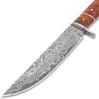 The blade has a Damascus-style pattern on it