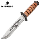 It has the classic stacked, genuine leather handle, recognizable the world over, and a black, non-reflective handguard