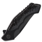 Knife is shown closed with handle made of black anodized 6061 aluminum with black CNC scalloped G10 inserts.