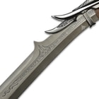 A detailed view of the etched runes on the blade
