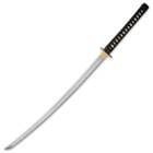 The 28 7/10”, hand-forged 1045 carbon steel blade is razor-sharp, and it extends from a brass habaki