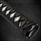 Close view of samurai sword sharp hand forged damascus steel blade
