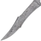 The full-tang, fileworked 12 1/2” Damascus steel blade has a trailing, modified clip point with a penetrating point
