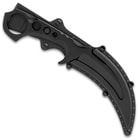 The stinger kerambit in its sheath.