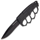 The Rampage Trench Folding Knuckle Knife shown in its deployed position