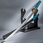 Katana sword with brass tsuba and handle with teal cord rayskin on top of a black scabbard displayed on a black wooden stand
