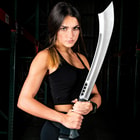 Woman dressed in black posed holding large stainless steel sword with sharp pointed tip
