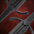 A closeup of the guards of the training dagger and training sword.