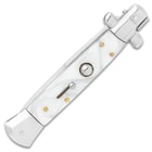 The pearl handle of the stiletto knife
