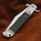 A detailed look at the automatic knife's wooden handle