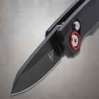 Close-up of black knife blade and handle