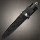 The dagger has a black, wire-wrapped hilt and features a shiny, black chrome guard and skullcrusher pommel