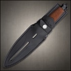 The handle is wrapped in copper-colored wire, bookended by a black metal handguard and skull crusher pommel