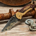Steampunk knife on rustic surface with chains and gears