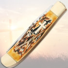 Closed pocket knife with cross design on handle