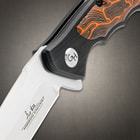 The pocket knife in its closed position so that its unique handle is on display
