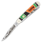 The pocket knife has laser-etched stainless steel blades