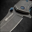 Closed bloodwood pocket knife with a raindrop patterned blade and metallic blue accents along with a japanese inscription in the wooden handle. 
