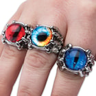 Each ring is intricately crafted into the shape of a dragon claw holding a realistic, piercing dragon eye made of acrylic