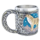 IThe wolf is exquisitely textured and painted on a background of blue star-lit sky over mountains