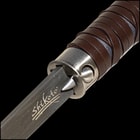 Close up image of the button that pushes the blade out on the Damascus Gentleman's Hook Sword Cane.