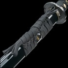 Detailed view of the katana's handle, pommel and scabbard
