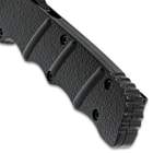 A close-up of the ridged handle