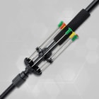 A detailed view of the blowdarts in their quiver