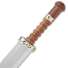 The ridged handle of the dagger