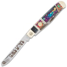 The razor-sharp, stainless steel blades have intricately detailed laser-etching.