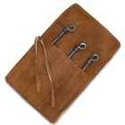 A view of the dining utensils in their individual slots in the pouch